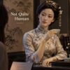 A gallery visitor observes Lifelike Wax Sculptures posed with tea and traditional cultural objects, their glossy features revealing their artificial appearance.